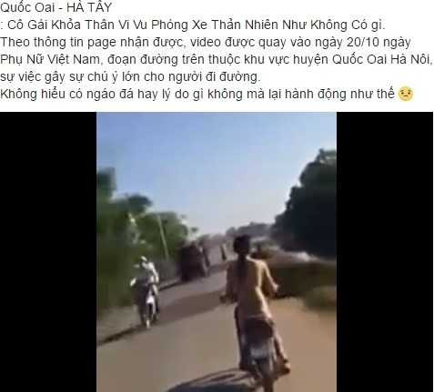 Co gai khoa than di xe may giua duong pho Ha Noi hinh anh 1