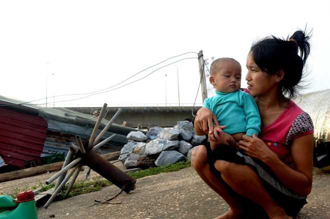 Xom chai khong ho khau giua long thi xa hinh anh 7