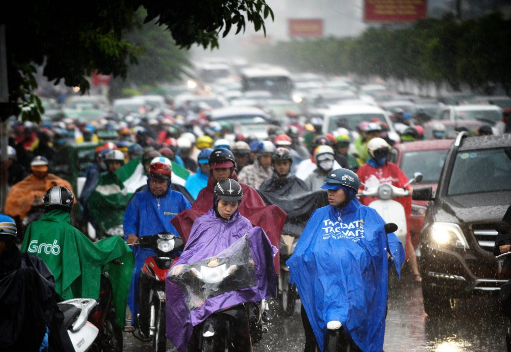 Hinh anh Thoi tiet hom nay 17/5: Bac Bo nang rao, Nam Bo mua to