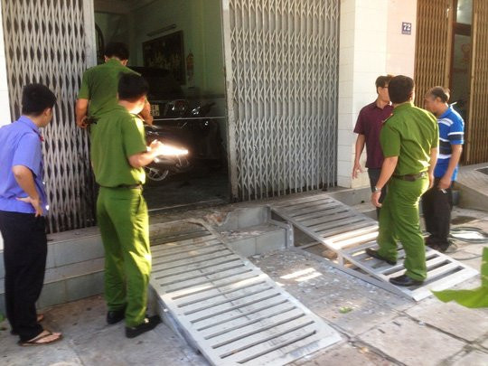 Nghi nổ mìn trước cửa doanh nghiệp, chủ bị thương nặng - Ảnh 3.