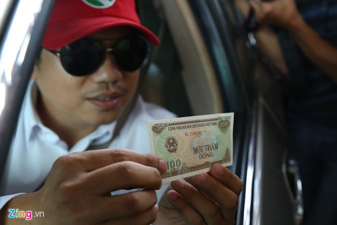 Tai xe chuan bi tren 10 kg tien xu de qua BOT Cai Lay hinh anh 2