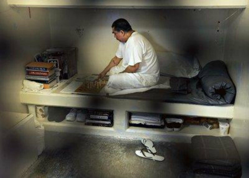 An inmate plays solitary chess in his Secure Housing Unit cell at Pelican Bay State Prison near Crescent City Calif Wednesday 3