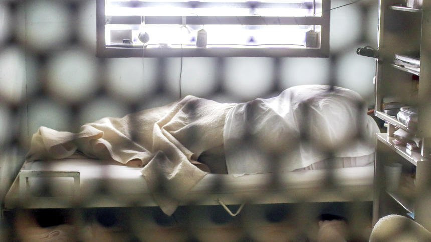 ...An inmate sleeps in his restricted housing cell Thursday, Dec. 15, 2016, inside the Jameson Annex at the state penitentiary in Sioux Falls, S.D. (Jake ShamaForum News Service) 3