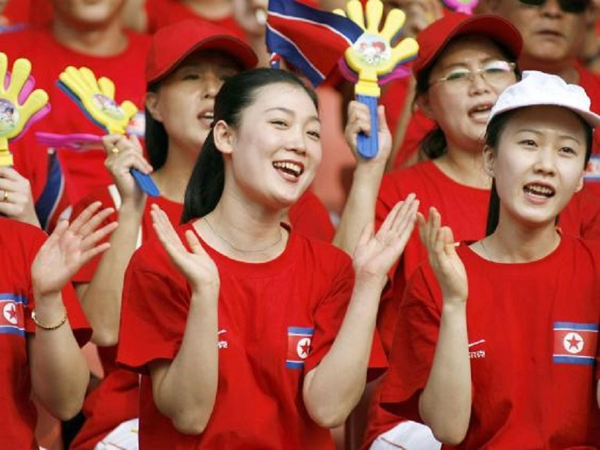 co-vu-trieu-tien-North Korean cheerleaders show support for their team before a match against Germany in the women's football World Cup in Wuhan in 2007-independent 3