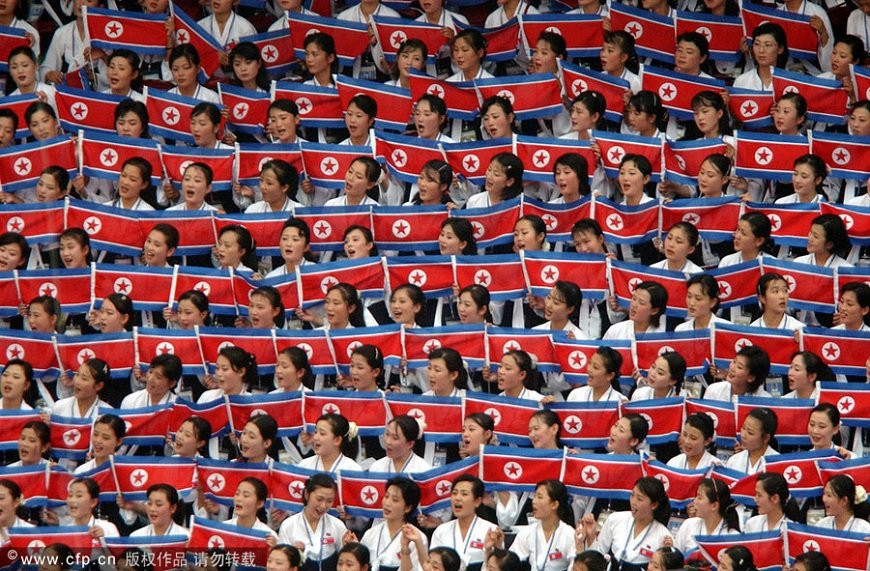 co-vu-trieu-tien-North Korean women hold national flags to cheer at 14th Asian Games in Basun, South Korea, 2002. North Korea has said it will send a cheering squad to the forthcoming Asian Games. 3