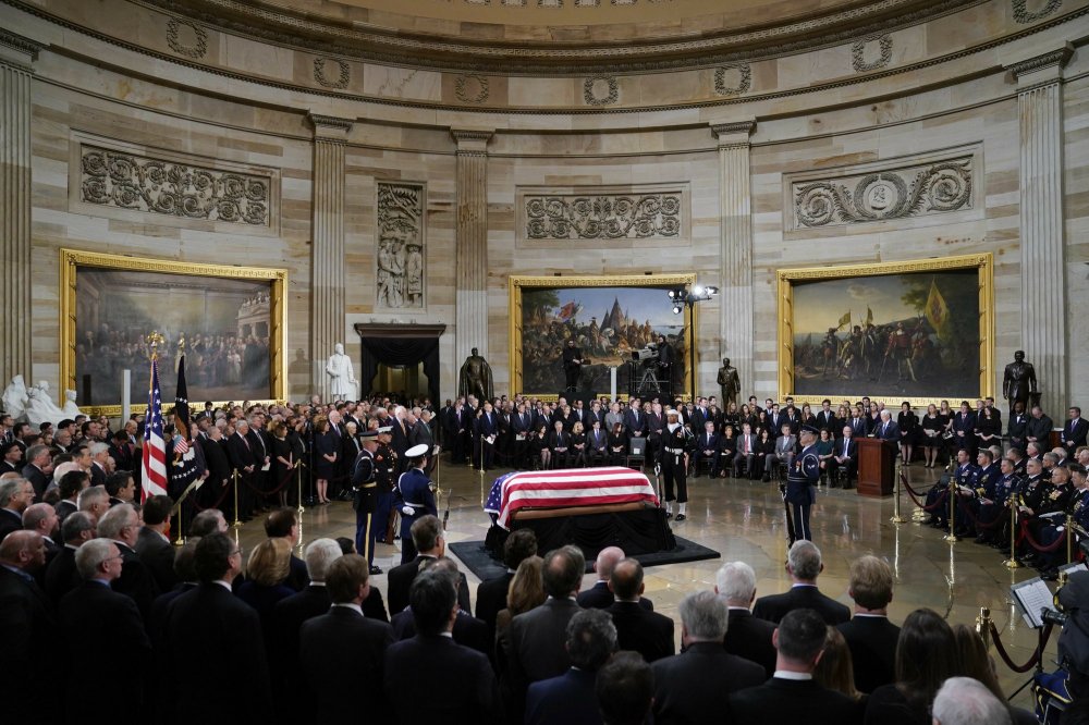 trump-melania-bush-funeral-4 3