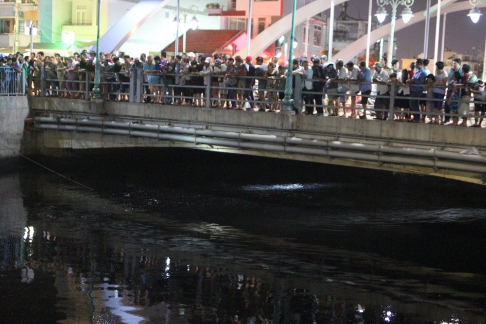 Hinh anh Nam thanh nien nghi cuop giat nhay xuong kenh mat tich