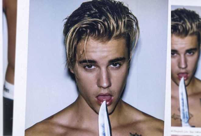 Justin Bieber lai gap su co voi anh khoa than hinh anh 3