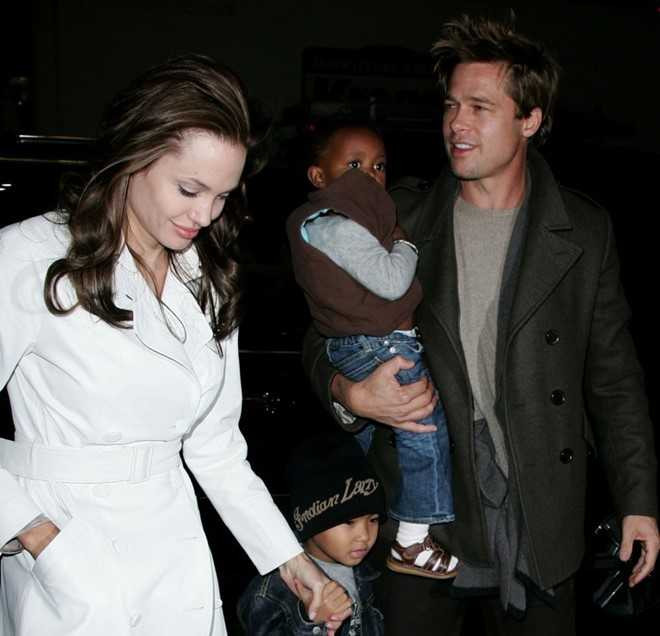 Angelina Jolie - Brad Pitt: 12 nam thien tinh su Hollywood hinh anh 11