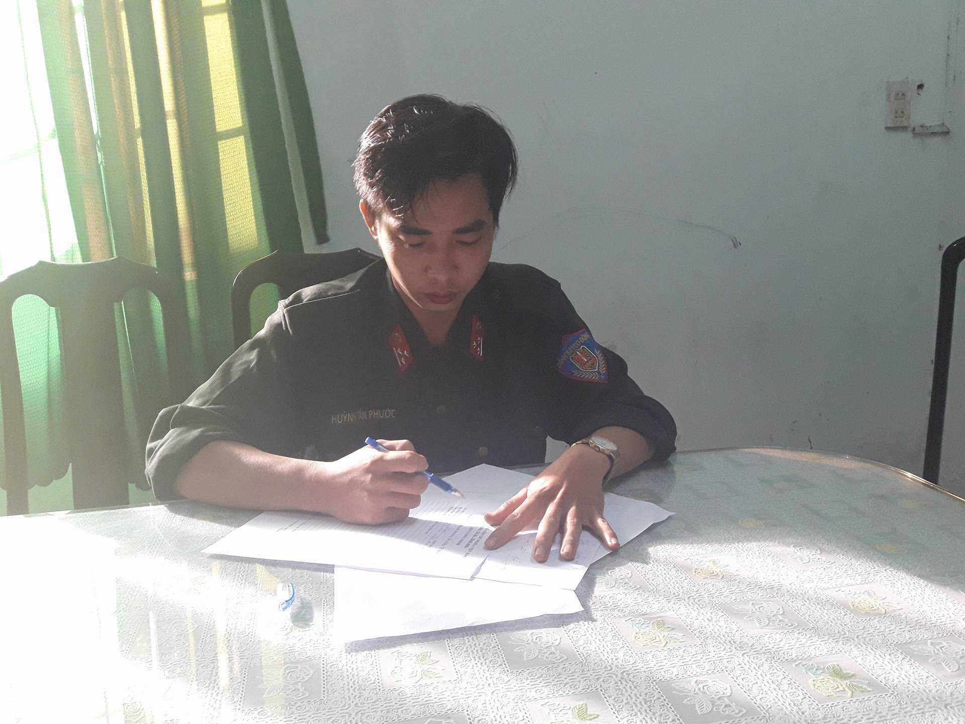 Huỳnh Tấn Phát tại cơ quan công an /// Ảnh: Lê Lâm