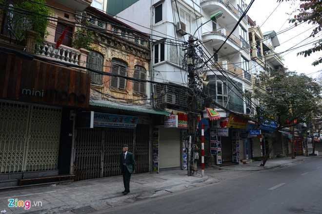 Ha Noi vang lang sang mung 1 Tet hinh anh 6