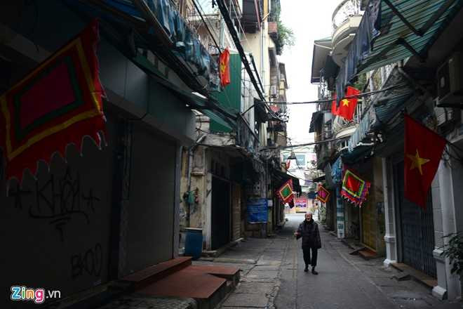 Ha Noi vang lang sang mung 1 Tet hinh anh 4