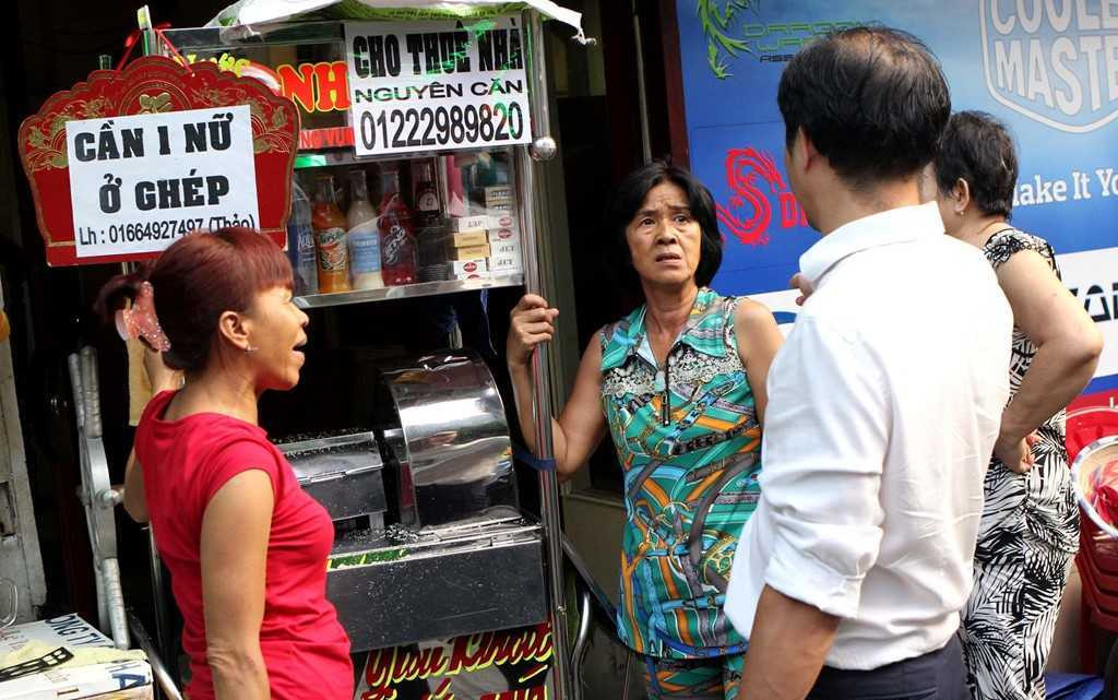 Chu tich phuong Ben Thanh go cua nhac nho tung ho dan lan chiem via he hinh anh 7