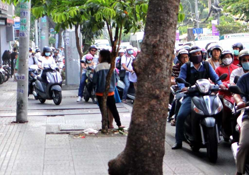 Chu tich phuong Ben Thanh go cua nhac nho tung ho dan lan chiem via he hinh anh 8