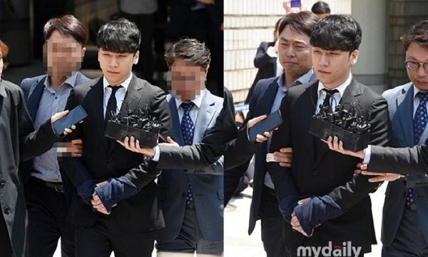 Seungri bị trói và còng tay khi rời tòa án, có thể ở tù 2 - 3 năm