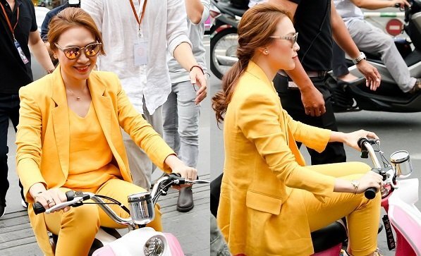 Mỹ Tâm chạy xe điện mini trên phố đến gặp fan