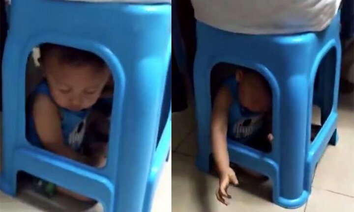 Mẹ ác nhốt con dưới gầm ghế, ngồi lên trên để chơi mạt chược