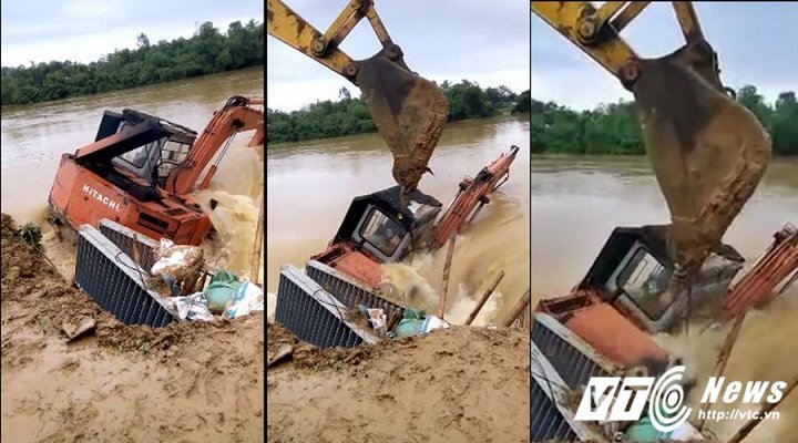 Cận cảnh dìm máy múc hàng trăm triệu đồng xuống chân đê ngăn nước lũ ở Thanh Hóa