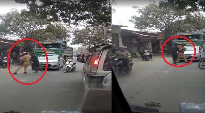 Đang xử lý xe tải làm rơi đất cát ra đường, CSGT bị 2 thanh niên xô đẩy