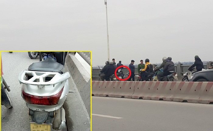 Bỏ lại xe máy, người đàn ông nhảy sông Hồng tự tử
