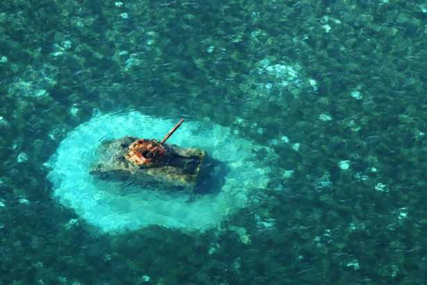 Xác máy bay, tàu chiến nằm la liệt tại hòn đảo thiên đường ở Thái Bình Dương