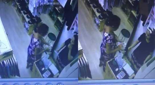 Nghi bị thôi miên, nữ nhân viên mở tủ đưa tiền cho khách lạ