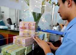 Nhiều ngân hàng điều chỉnh lãi suất VND lên 12%/năm