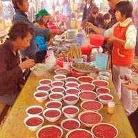 Bị ấu trùng sán bám vào não sau khi ăn tiết canh lợn