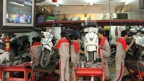 Dọn ôtô, sửa xe máy kiếm đậm ngày cận tết