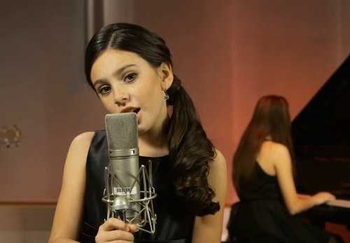 'Sốt xình xịch' cô bé 9 tuổi cover nhạc phim Skyfall