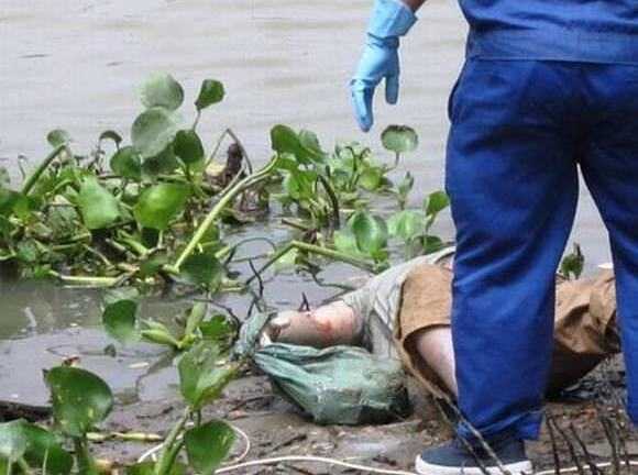 Phát hiện xác chết 2 tay bị cột trong bao tải đá