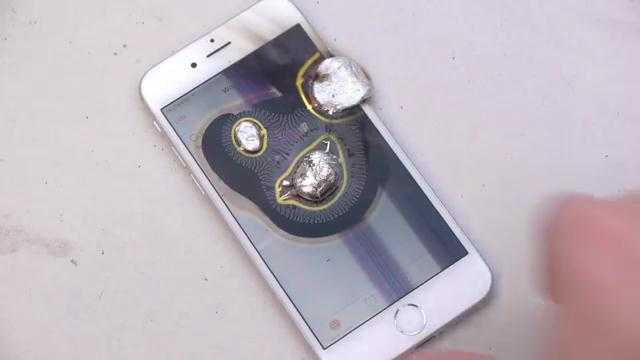 'Tra tấn' iPhone 6 bằng nhôm nóng chảy