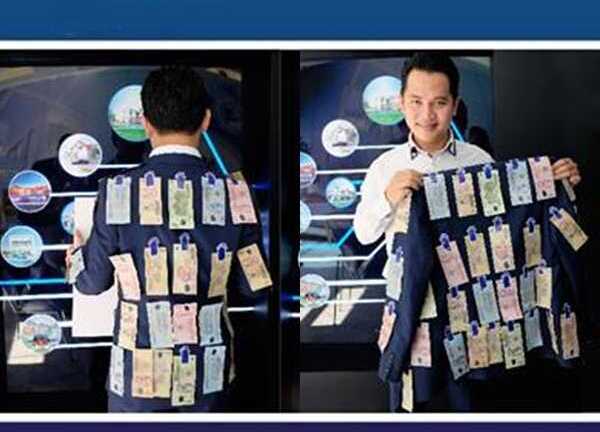 Sự thật trần trụi đằng sau video thanh niên dán tiền khắp người mời lấy miễn phí