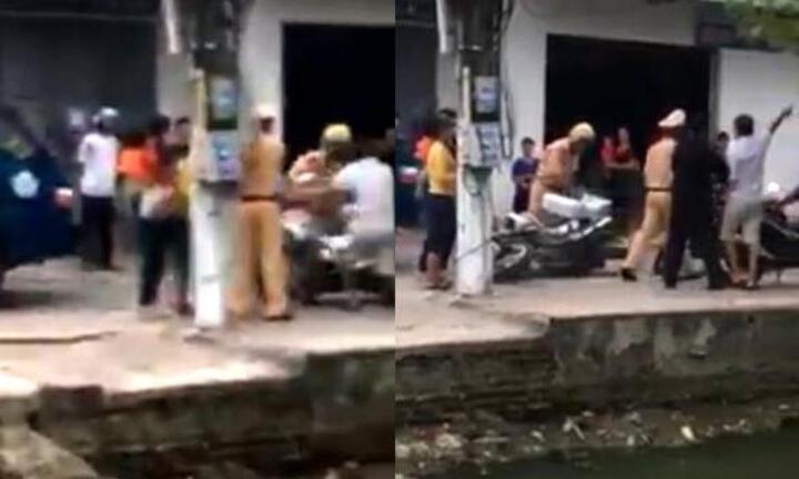 Bị xử lý, tài xế vi phạm chửi bới, đạp đổ xe đặc chủng CSGT