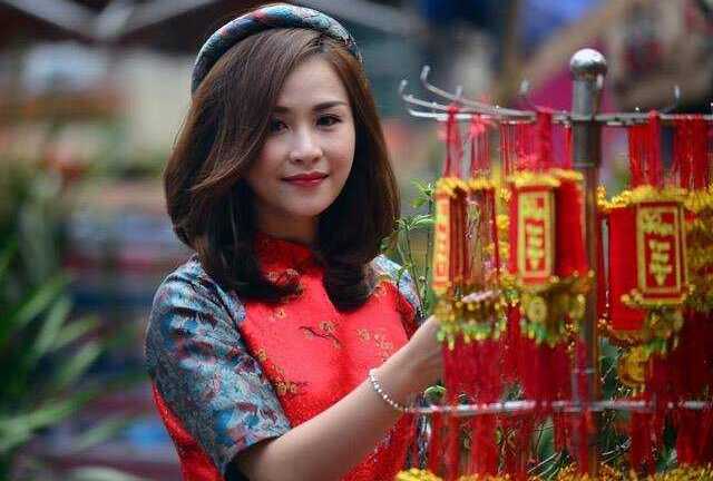 'Xiêu lòng' với bộ ảnh Tết của nữ tiếp viên trưởng Vietjet Air