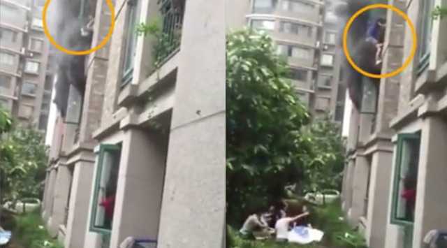 Clip: Cháy nhà, bố ném con 3 tuổi từ tầng 3 xuống