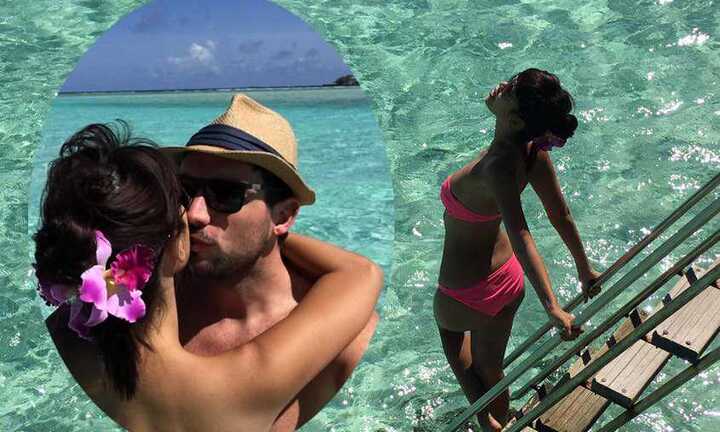 Hà Anh diện bikini, nồng nàn hôn chồng ở 'thiên đường nơi hạ giới'