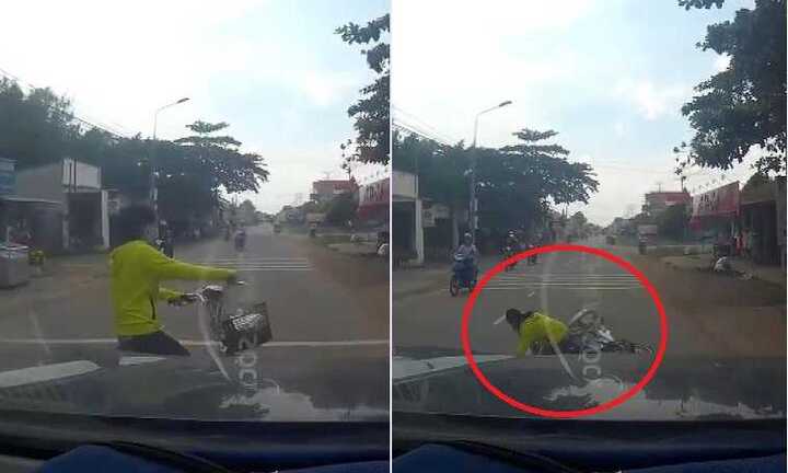 Thiếu nữ đeo tai nghe vô tư sang đường bị ôtô tông ngã