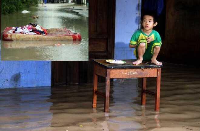 Mưa lũ ở Nha Trang: Đồ đạc bị cuốn trôi, trẻ con lên bàn ngồi
