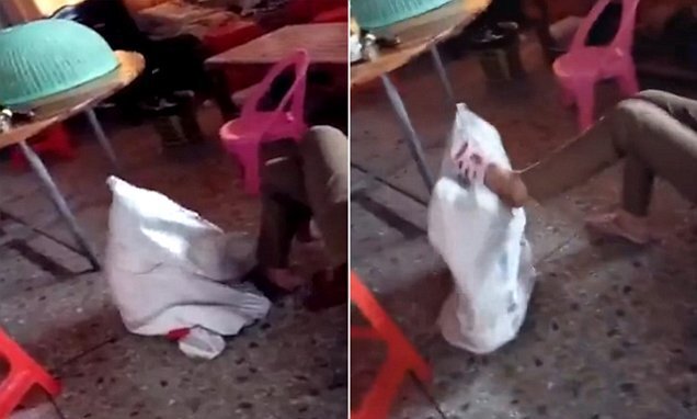 Phẫn nộ clip bé gái bị bà nhét vào bao tải, đánh đập dã man