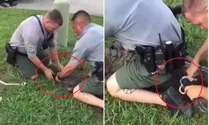 Đi lạc vào gara ô tô, cá sấu bị buộc mõm, còng chân