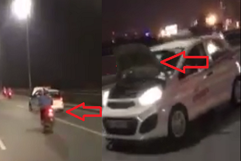 Taxi bị lật nắp capo phóng tốc độ cao, đánh võng trên cầu Nhật Tân