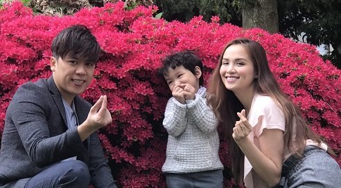 Hoa hậu Diễm Hương chạy show cùng chồng con giữa tin đồn ly hôn