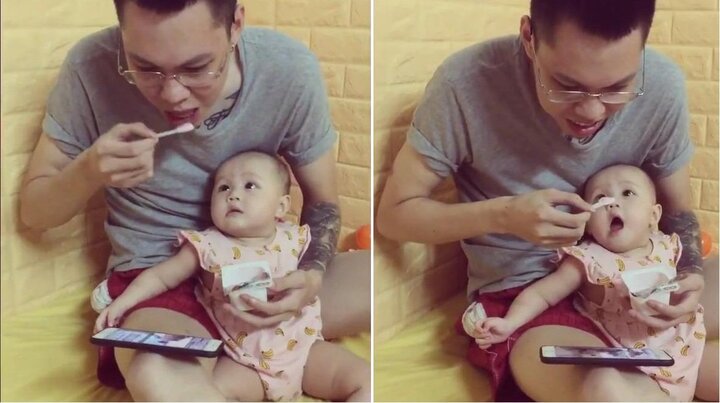 Bố mải xem phim, ăn sữa chua, quên béng con gái nhỏ khiến dân mạng phì cười
