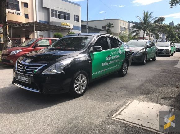 Dịch vụ đi chung xe của Grab, Uber bị 'tuýt còi'