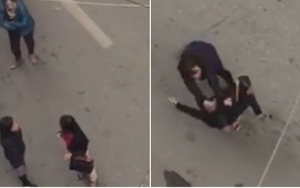 'Nhắc nhở' tài xế lùi xe cẩn thận, người phụ nữ bị đánh túi bụi