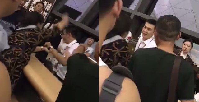 Bị nữ hành khách bạt tai tới tấp, nam nhân viên sân bay vẫn cười tươi