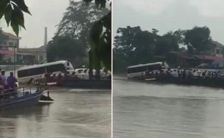 Xe khách sắp trôi tuột xuống nước vẫn bám phà vượt sông ở Hải Dương