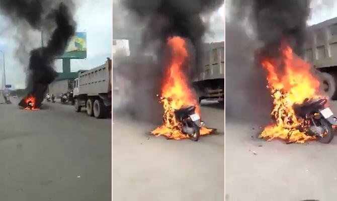 Xe máy đang chạy bỗng bốc cháy ngùn ngụt ở Bình Dương