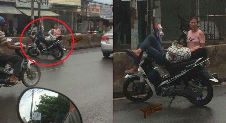 Thanh niên thản nhiên dựng xe máy, nằm ngủ 'quên đời' giữa quốc lộ